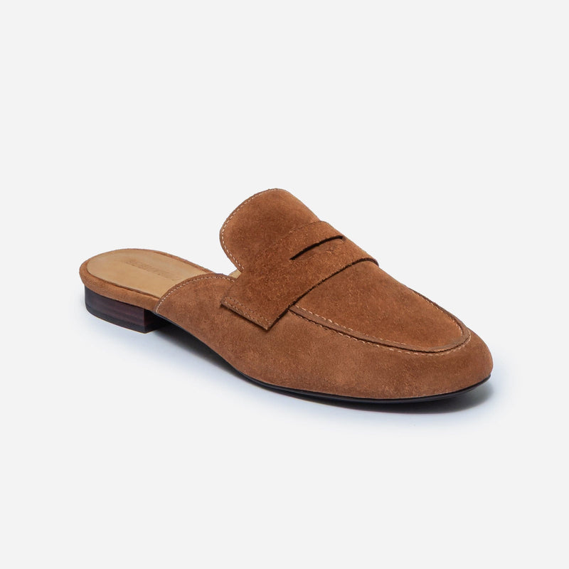 Brown suede loafer slipper on a white background