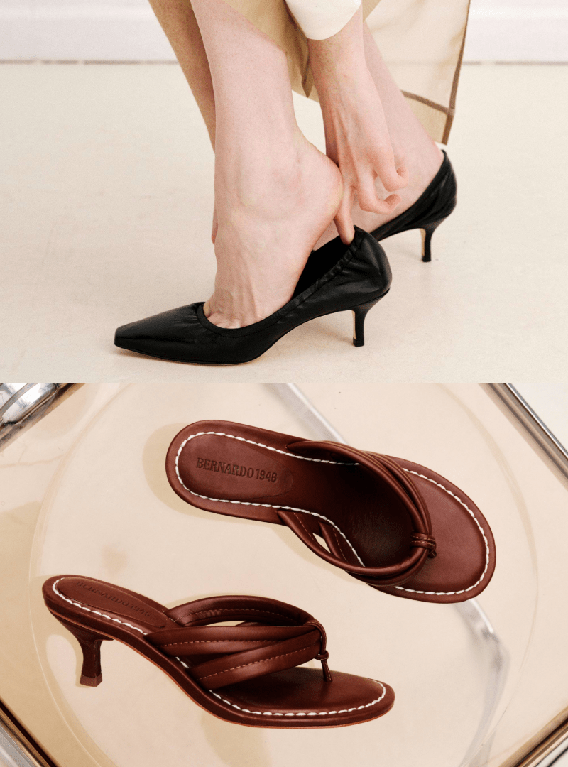 Brown high-heeled sandals on a glass surface with a blurred background